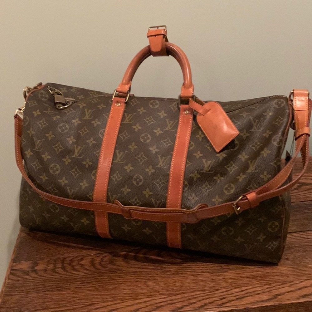 Make an offer: LV Keepall 50 Bandouliere WITH LOCK AND KEYS!!! -